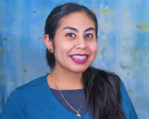 Female dental staff member smiling at Lake Ridge, VA dental practice.